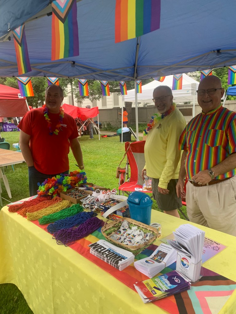 Pastor Gary and volunteers at the 2025 LGBT Pride Booth