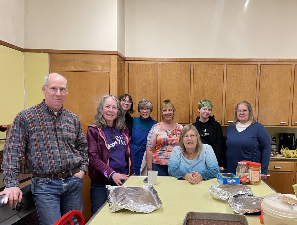 Kitchen volunteers preparing a meal